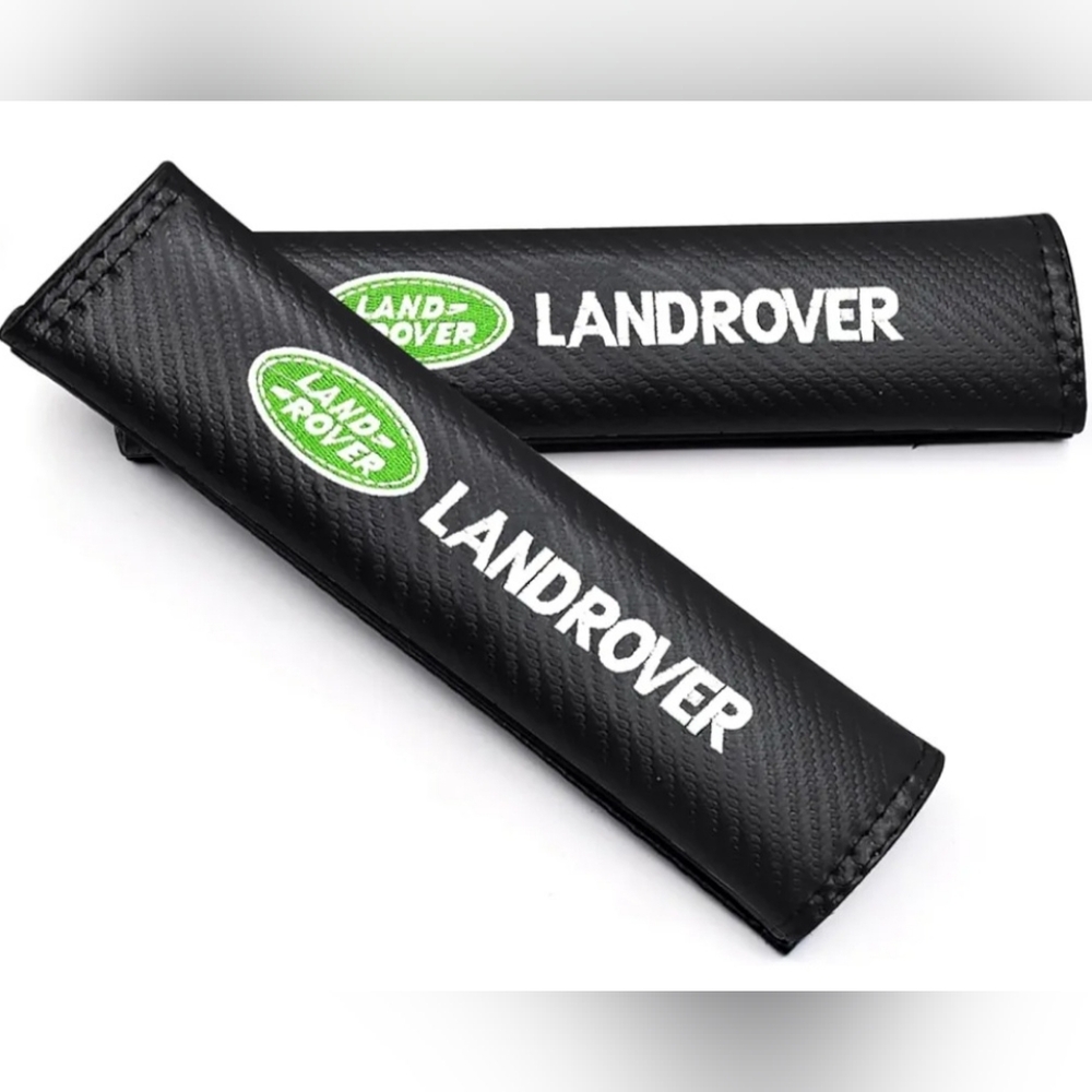 Two new Land Rover seat belt shoulder pads